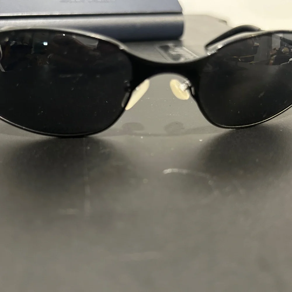 Sleek Black Oval Sunglasses